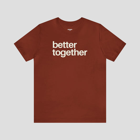 Rust colored t-shirt with the "Better Together" in lowercase white letters against light gray background