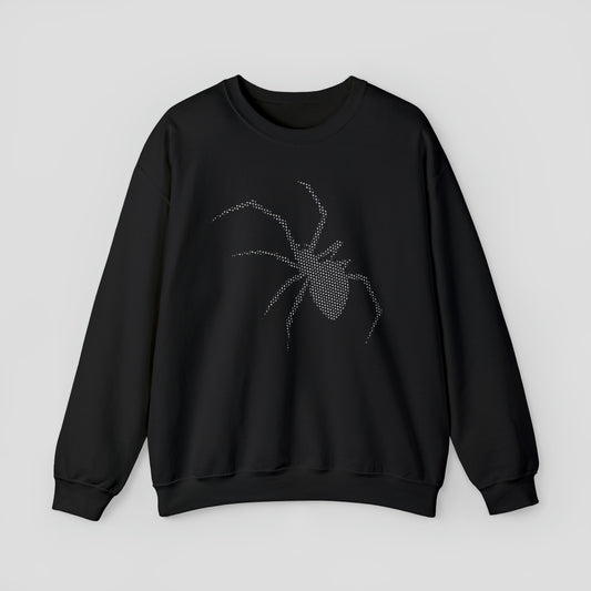 Front view of black sweatshirt with large white digitized image of a spider in center, against a gray background.