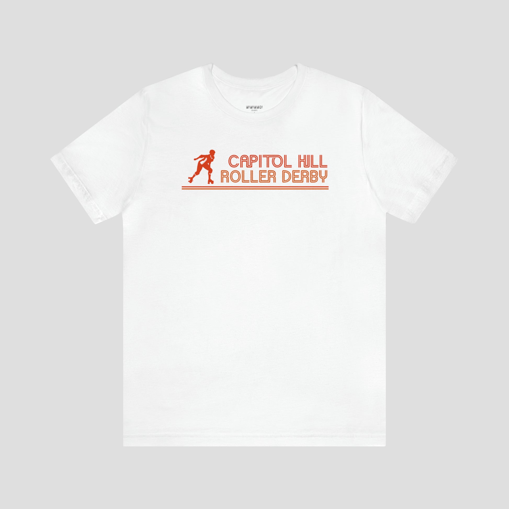 White t-shirt with the words "Capitol Hill Roller Derby" written in orange, lined font and silhouette image of a roller derby player to the left of the words across the chest, against a gray background.