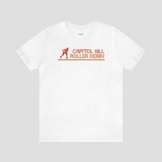 White t-shirt with the words "Capitol Hill Roller Derby" written in orange, lined font and silhouette image of a roller derby player to the left of the words across the chest, against a gray background.