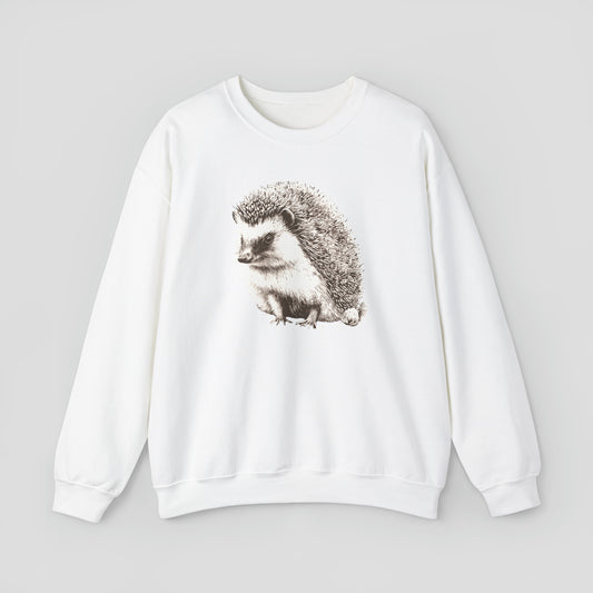 White sweatshirt with large illustrated image of white and brown hedgehog in the center, against a gray background.