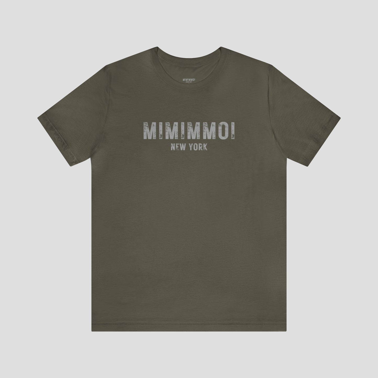 Army green t-shirt with the words Mimimmoi New York in distressed gray block letters across the chest, against a gray background.