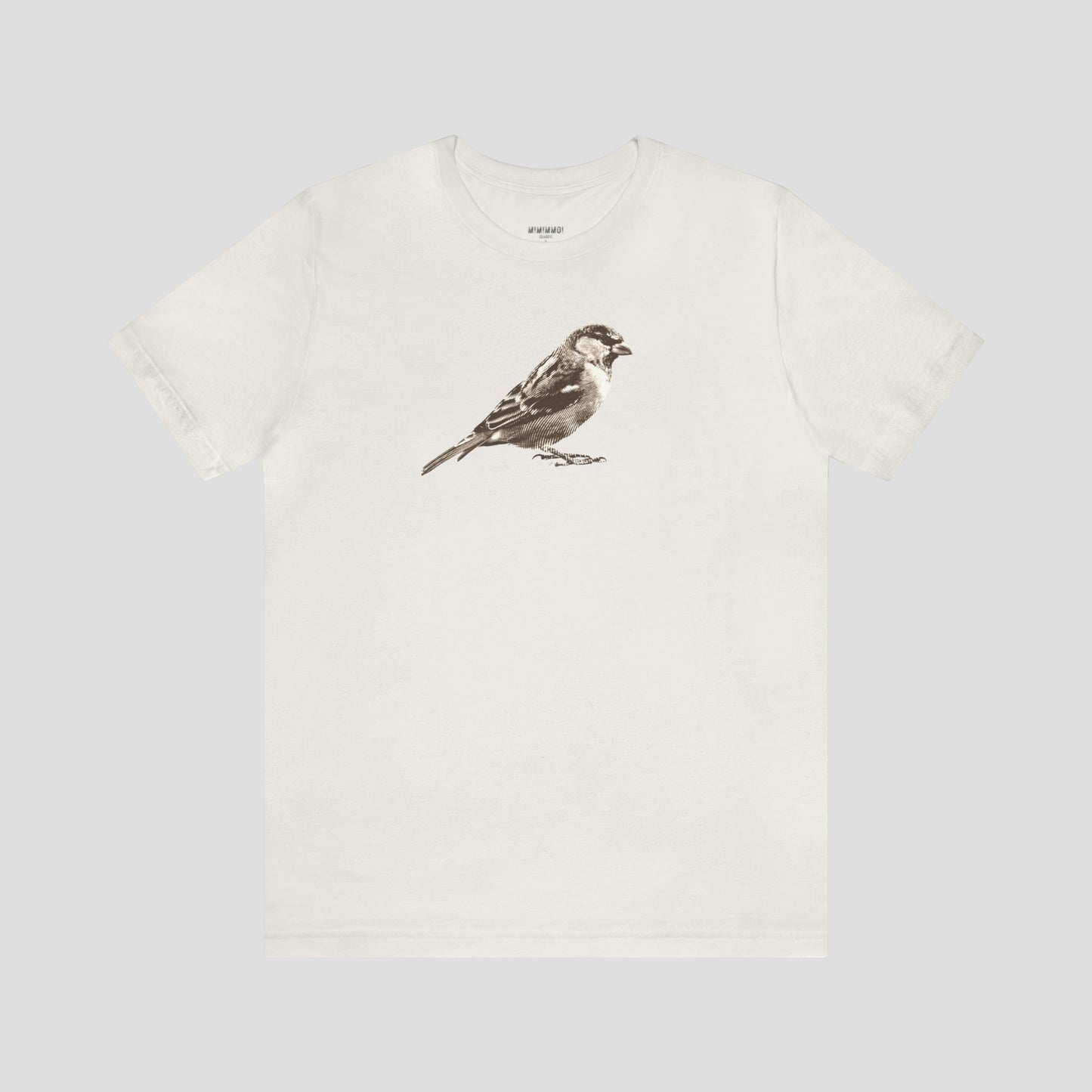 Vintage white t-shirt with large brown and white illustrated image of a sparrow across the chest, against a gray background.