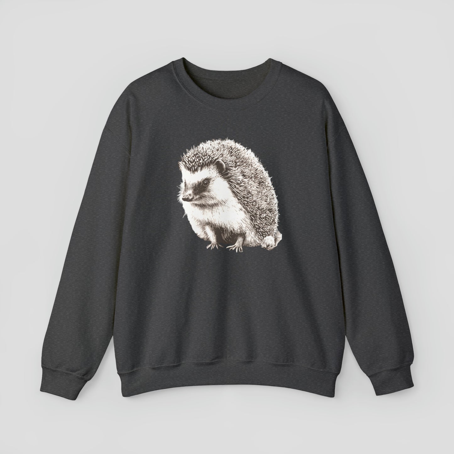 Dark gray sweatshirt with large illustrated image of white and brown hedgehog in the center, against a gray background.