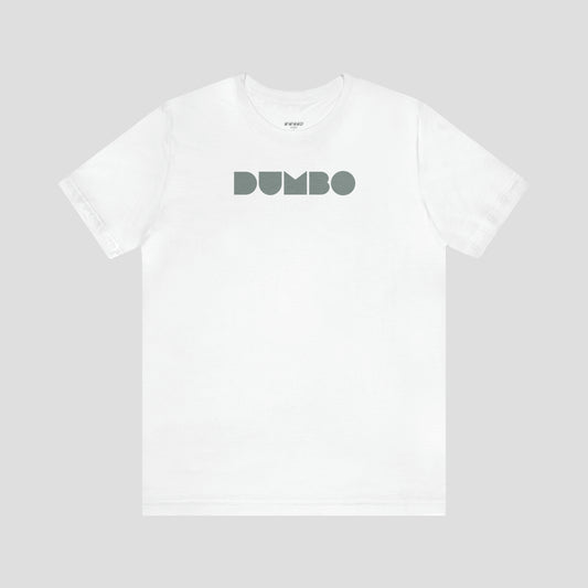 White t-shirt with the word Dumbo in gray block letters across the chest, against a gray background.