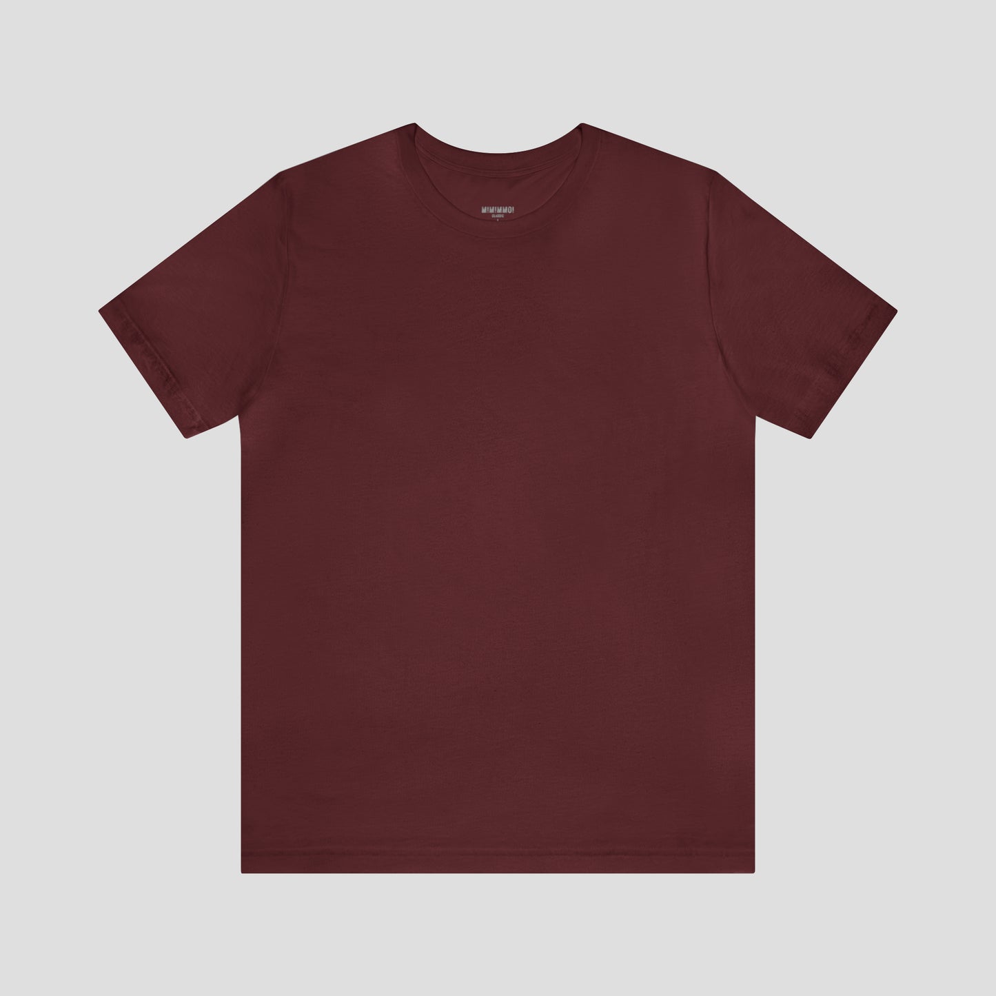 Maroon t-shirt against white background.