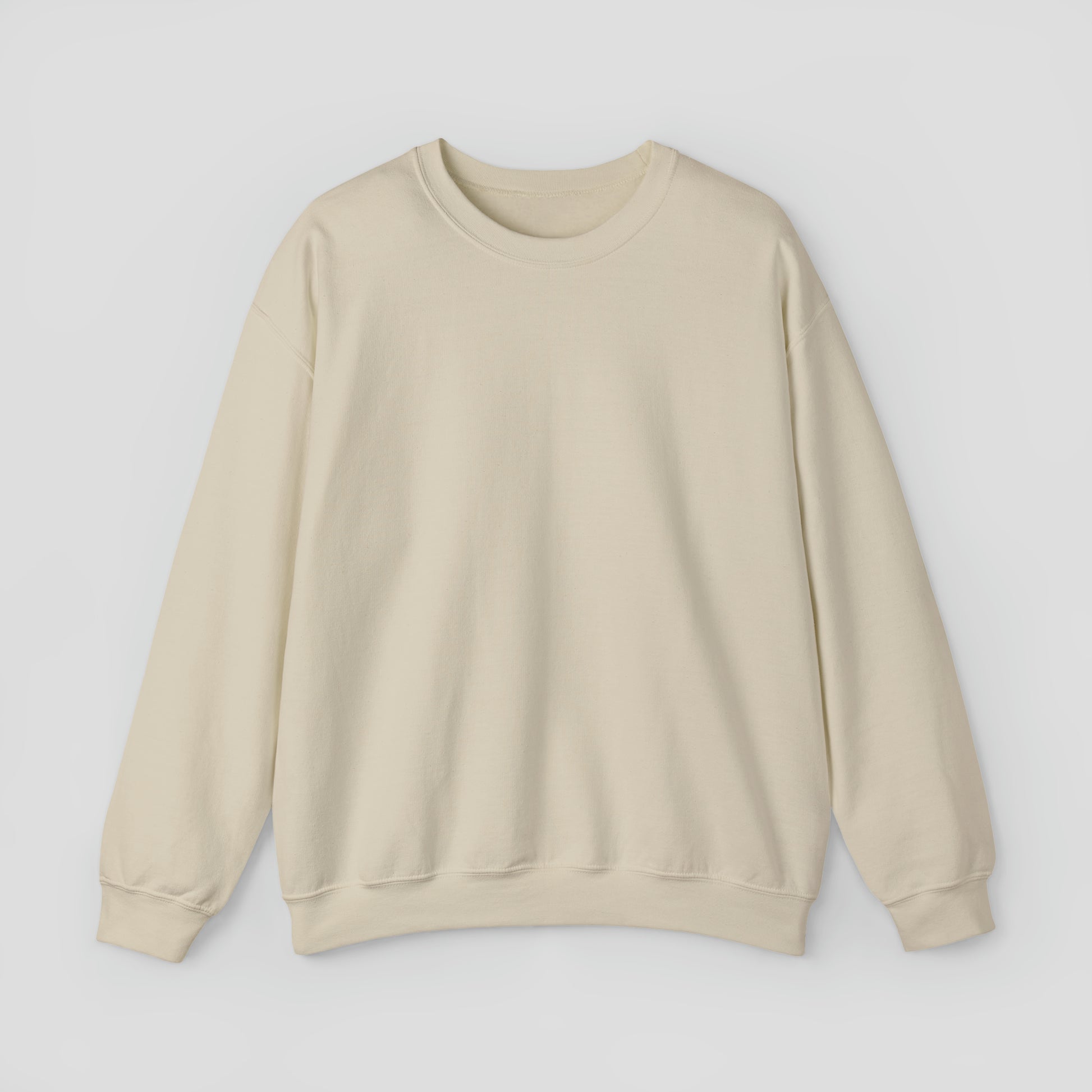 Front view of tan sweatshirt with light gray background.