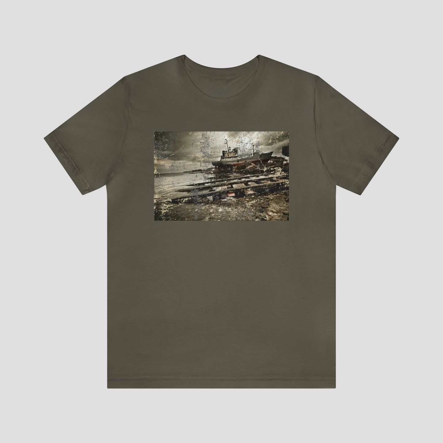 Army green t-shirt with distressed image of a shipwreck across the chest, against a gray background.