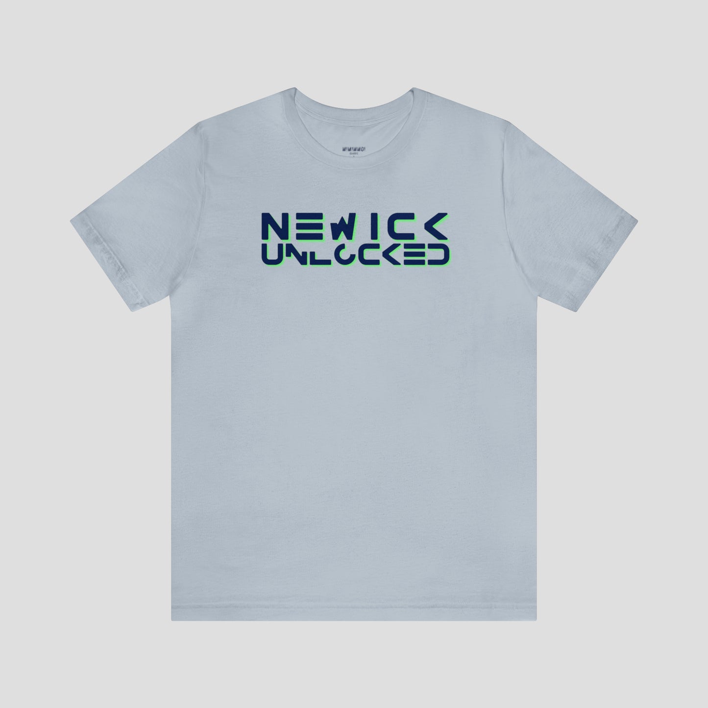 Light blue t-shirt with the words New Ick Unlocked in a navy futuristic font with green shadow, against a gray background.