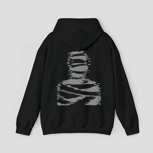 Back view of black hooded sweatshirt with hood down and large white digitized image of a mummy in center, against a gray background.