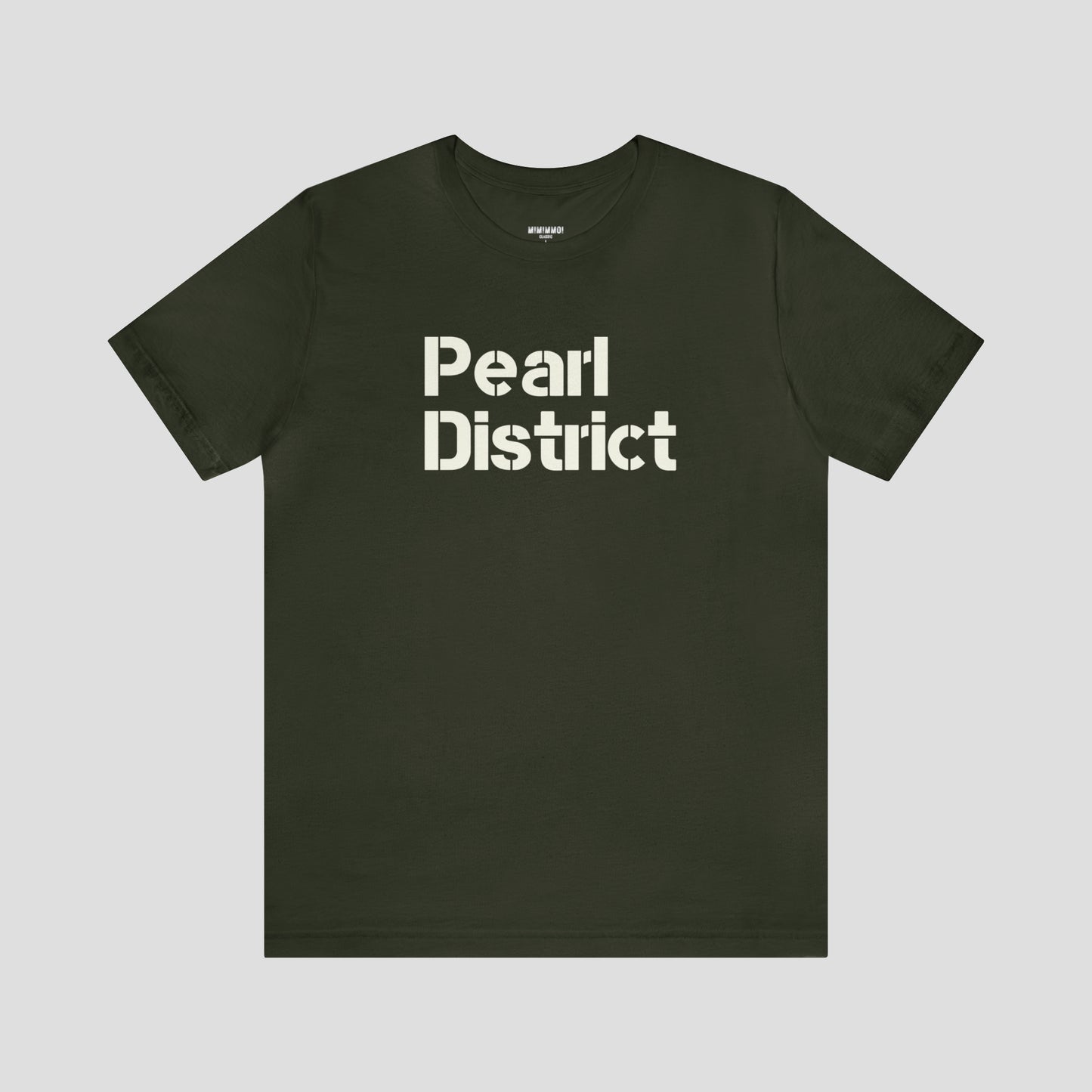 Front view of green t-shirt and large white stenciled lettering with the words Pearl District in center, against a gray background.